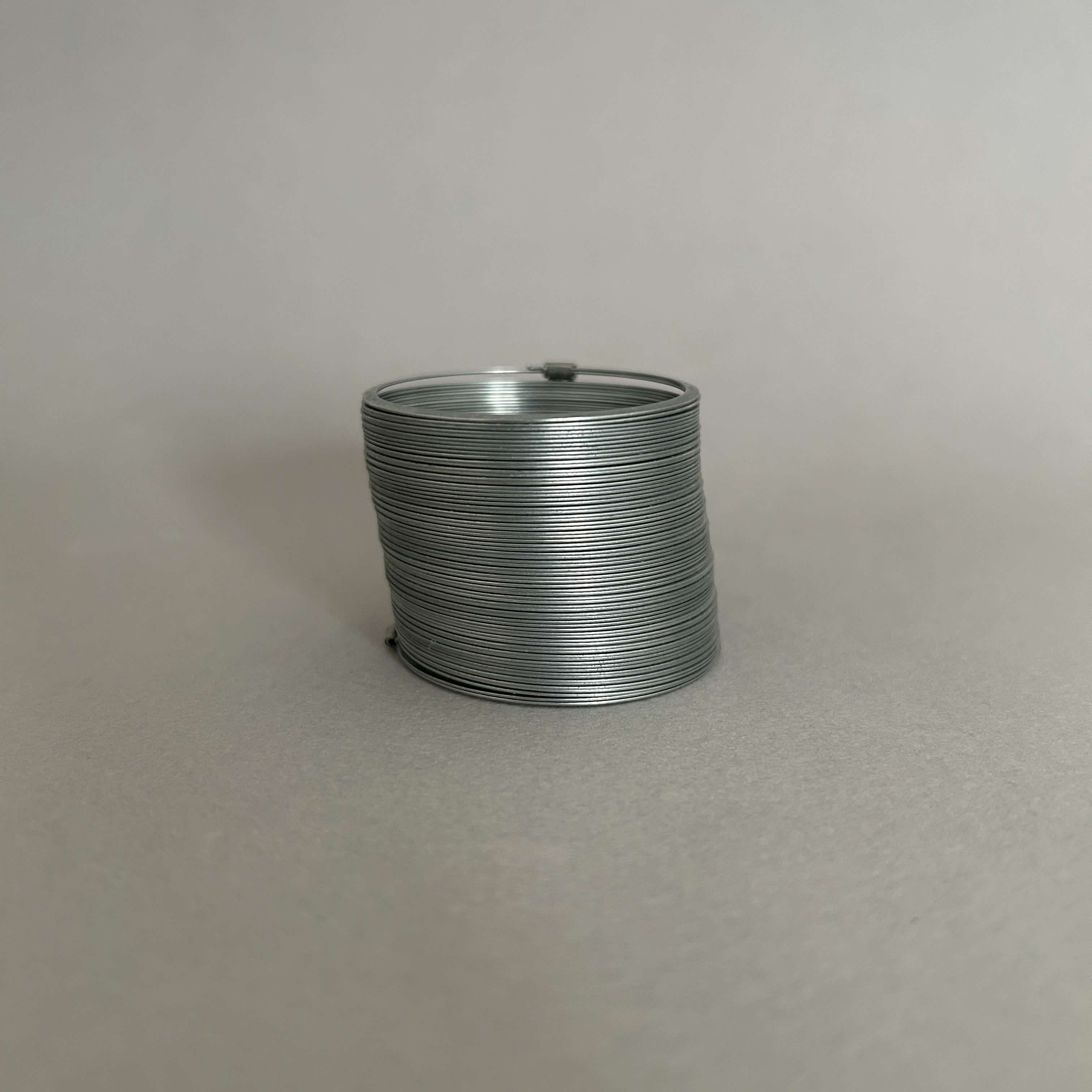 Tapping on a metal slinky to achieve the sound