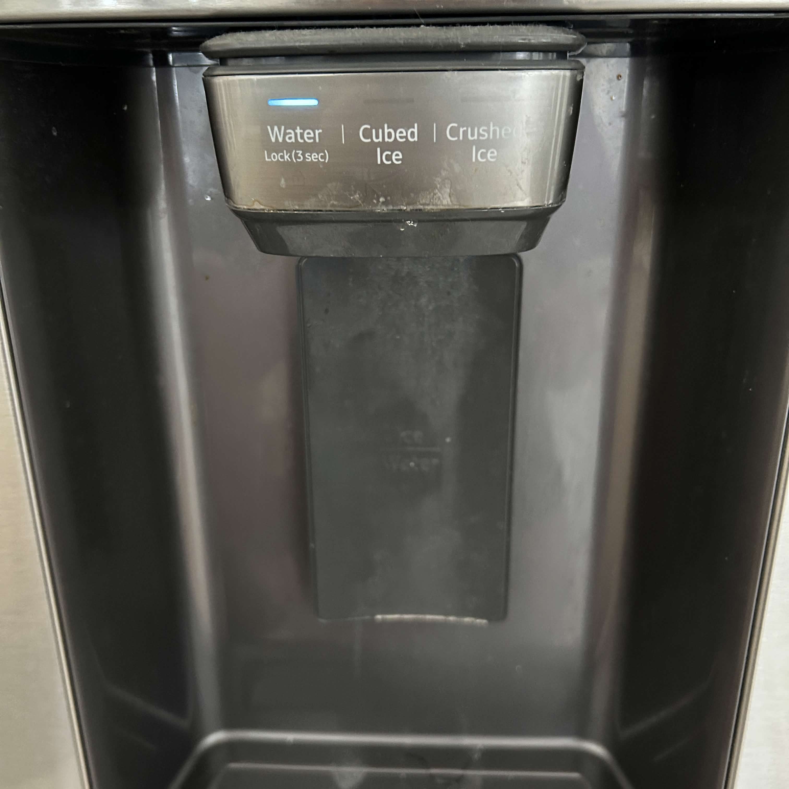 Filling a glass using the water dispenser