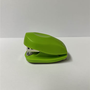 A mini stapler is a compact, handheld tool used to fasten small stacks of paper with metal staples.