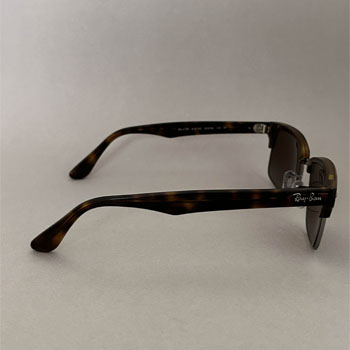 The curved lens shape offers full eye coverage and a flattering fit.